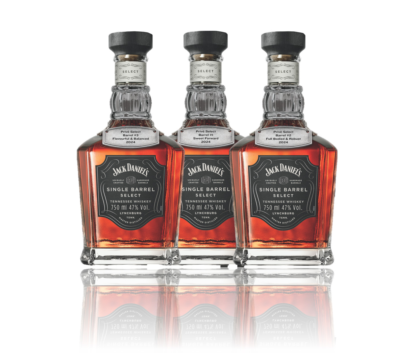 Three bottles of Jack Daniel's Priv on a white background